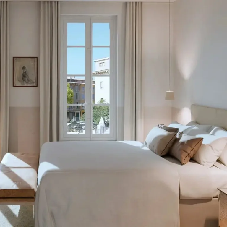 Bed and window in a Superior Room