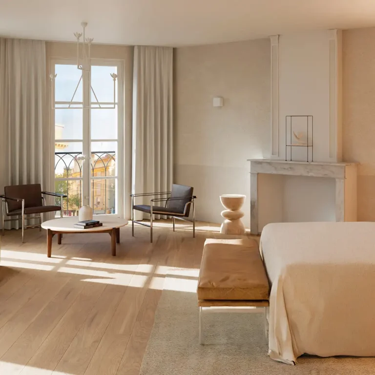 Seating area and window in the Suite at Les Grands Carmes, overlooking Aix-en-Provence